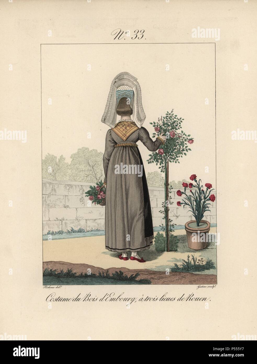 Costume of Bois d'Embourg. Rear view of the tall bavolet bonnet with lace tails. The model is the mother of the girl in plate 32. Hand-colored fashion plate illustration by Benoit Pecheux engraved by Gatine from Louis-Marie Lante's 'Costumes des femmes du Pays de Caux,' 1827/1885. With their tall Alsation lace hats, the women of Caux and Normandy were famous for the elegance and style. Stock Photo