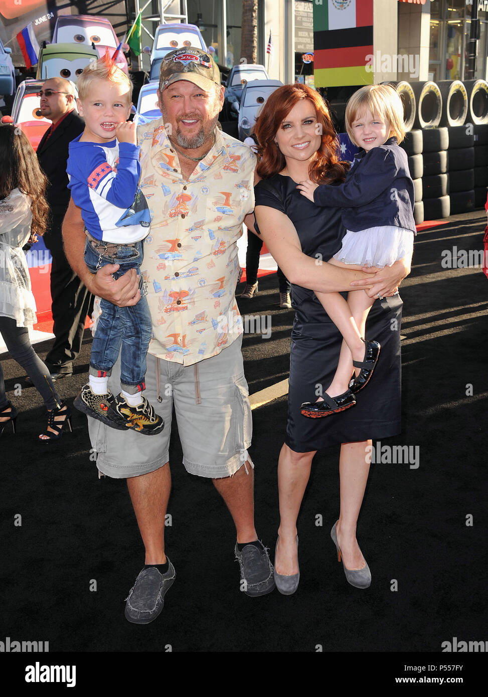 Larry The Cable Guy, wife and kids at Cars 2 Premiere at the El Capitan  Theatre In Los Angeles.Larry The Cable Guy, wife and kids 77 -------------  Red Carpet Event, Vertical, USA,