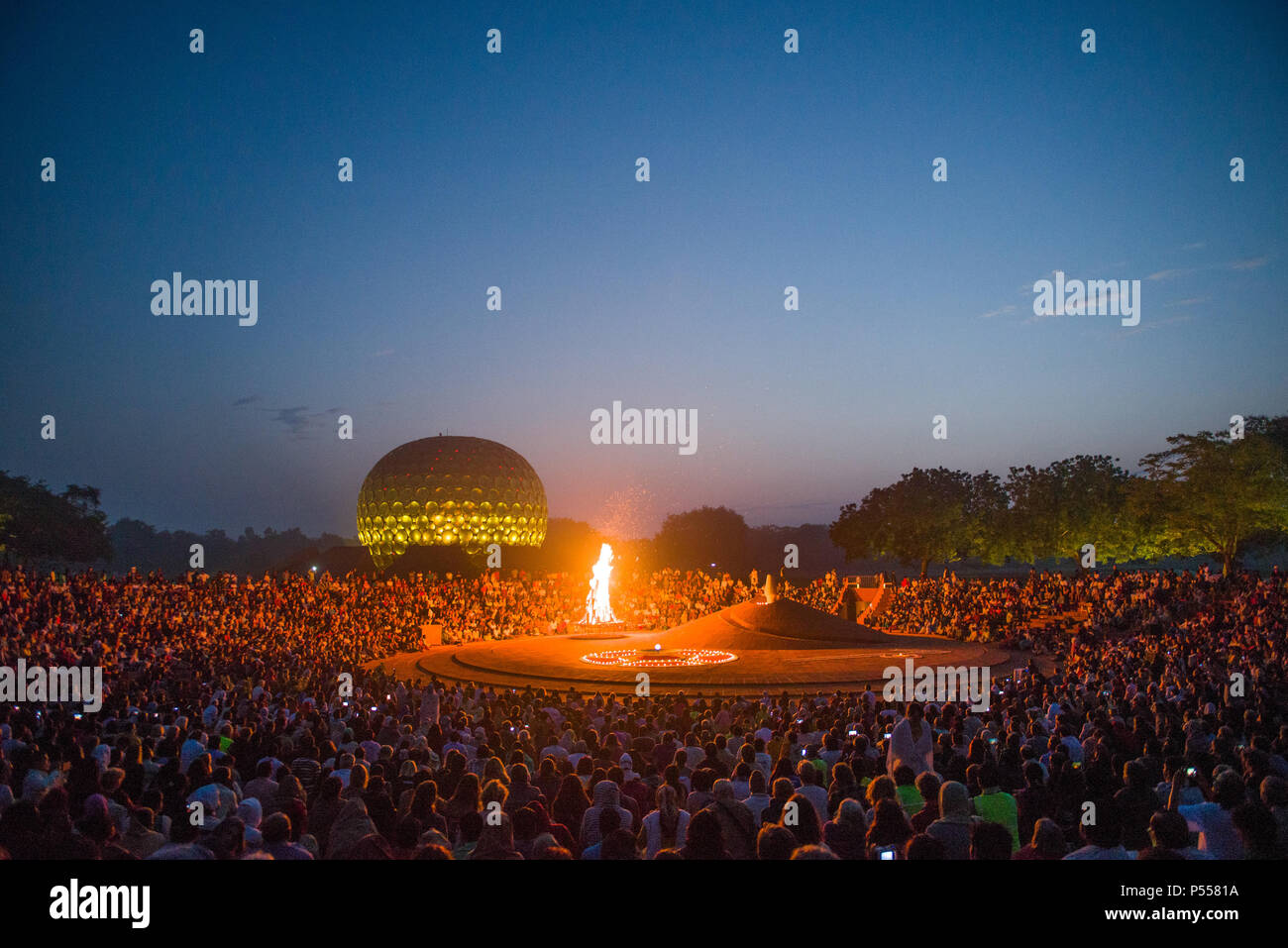 AUROVILLE, INDIA - 28 February 2018: The bonfire meditation before the water ceremony for the 50th anniversary of Auroville Stock Photo