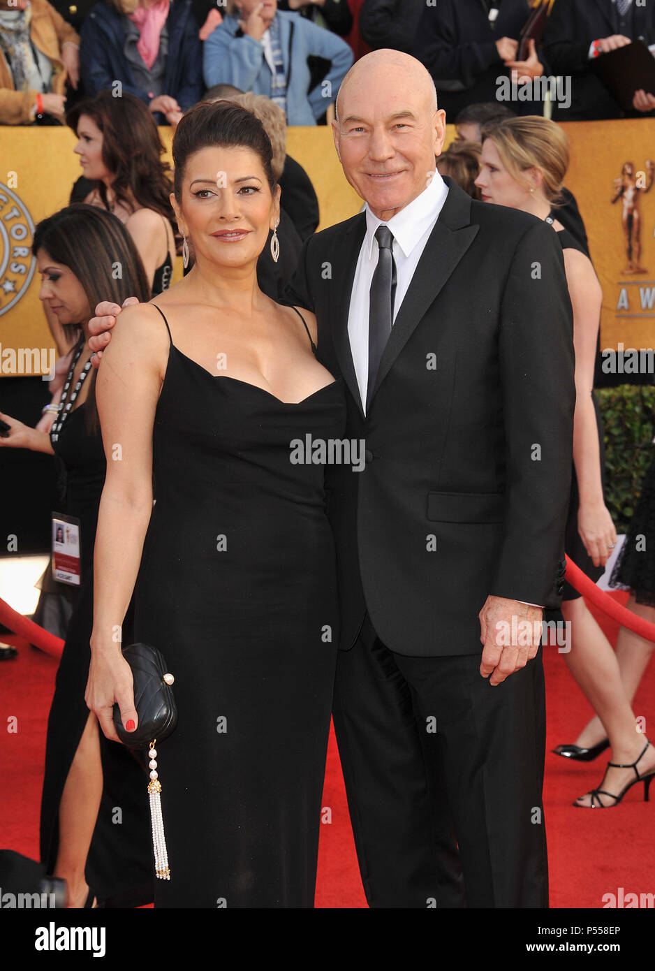 Patrick stewart with girlfriend red carpet event hi-res stock ...