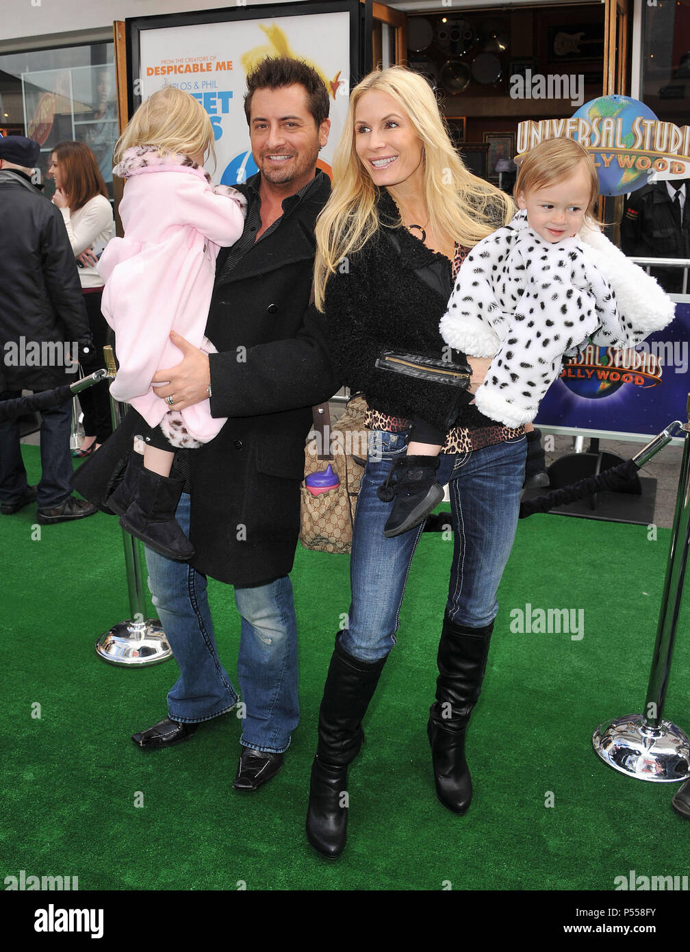 Peggy Tanous, Family  at the Hop Premiere at the Universal StudioTheatre In Los Angeles.Peggy Tanous, Family  58 ------------- Red Carpet Event, Vertical, USA, Film Industry, Celebrities,  Photography, Bestof, Arts Culture and Entertainment, Topix Celebrities fashion /  Vertical, Best of, Event in Hollywood Life - California,  Red Carpet and backstage, USA, Film Industry, Celebrities,  movie celebrities, TV celebrities, Music celebrities, Photography, Bestof, Arts Culture and Entertainment,  Topix, vertical,  family from from the year , 2011, inquiry tsuni@Gamma-USA.com Husband and wife Stock Photo