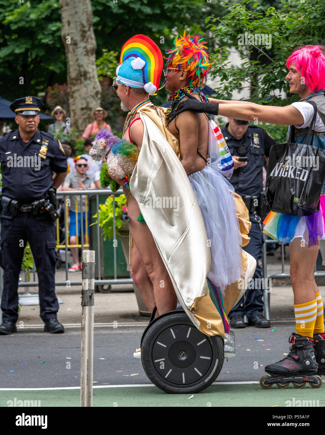 New York, USA, 24 June 2018. A policeman watches participants in the New York City Pride Parade 2018.  Photo by Enrique Shore Credit: Enrique Shore/Alamy Live News Stock Photo