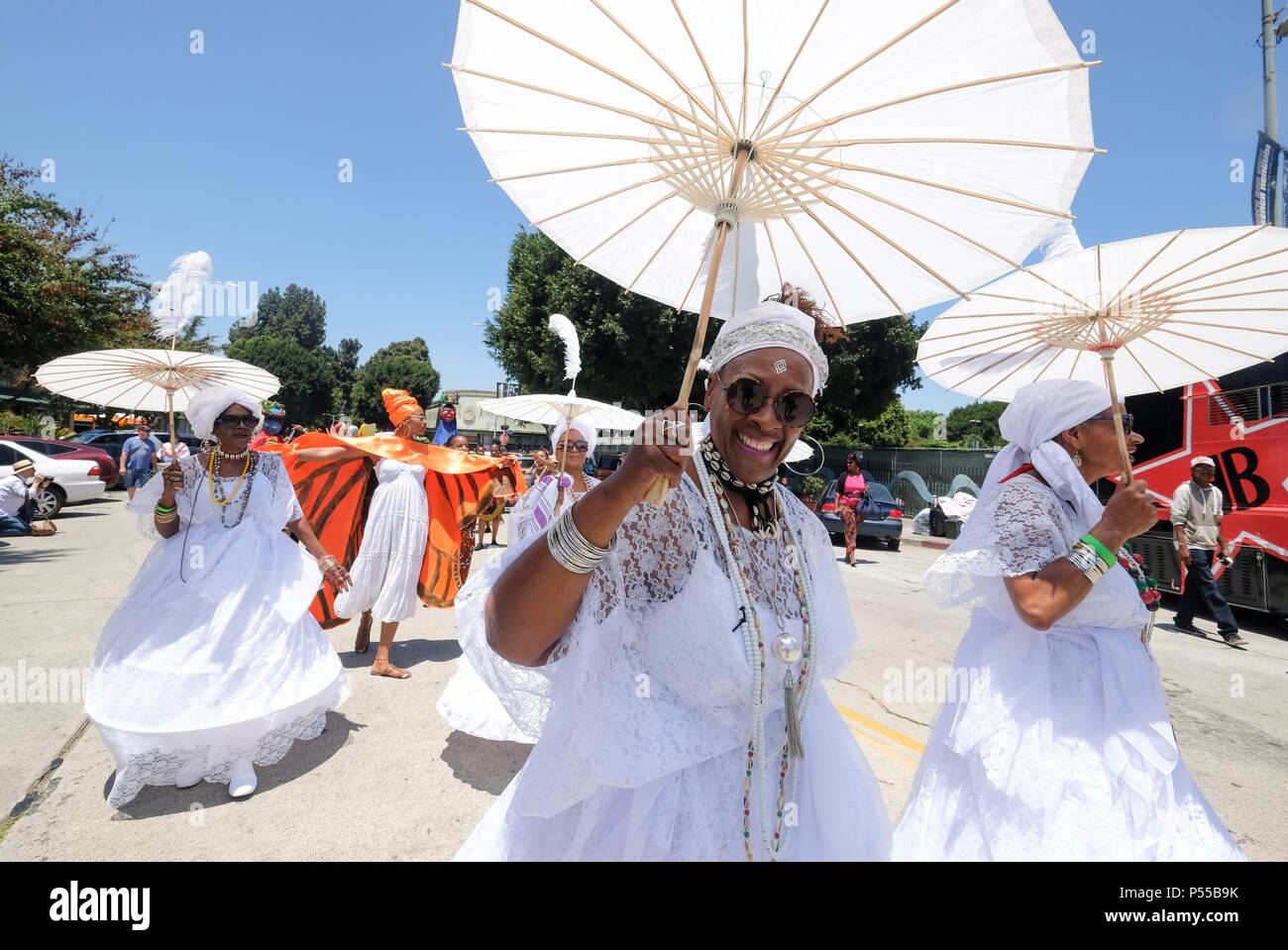 Los Angeles, USA. 24th June, 2018. People march at the 8th annual Day of the Ancestors: Festival of Masks in Los Angeles, the United States on June 24, 2018. Credit: Zhao Hanrong/Xinhua/Alamy Live News Stock Photo