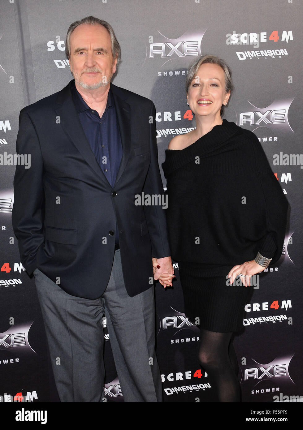 Wes Craven, wife 54 at the Global Green 15th Millenium Aw. 2011 at the  Fairmont Miramar Hotel in Santa Monica.Wes Craven, wife 54 -------------  Red Carpet Event, Vertical, USA, Film Industry, Celebrities,, image size:979x1390