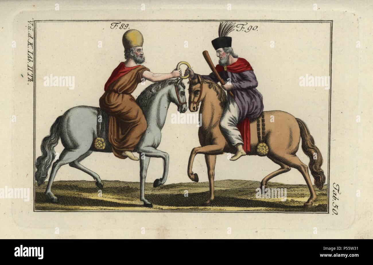 Two Persians on horseback clutching a brass ring - perhaps competing in a test of horsemanship. Handcolored copperplate engraving from Robert von Spalart's 'Historical Picture of the Costumes of the Principal People of Antiquity and of the Middle Ages' (1797). Stock Photo