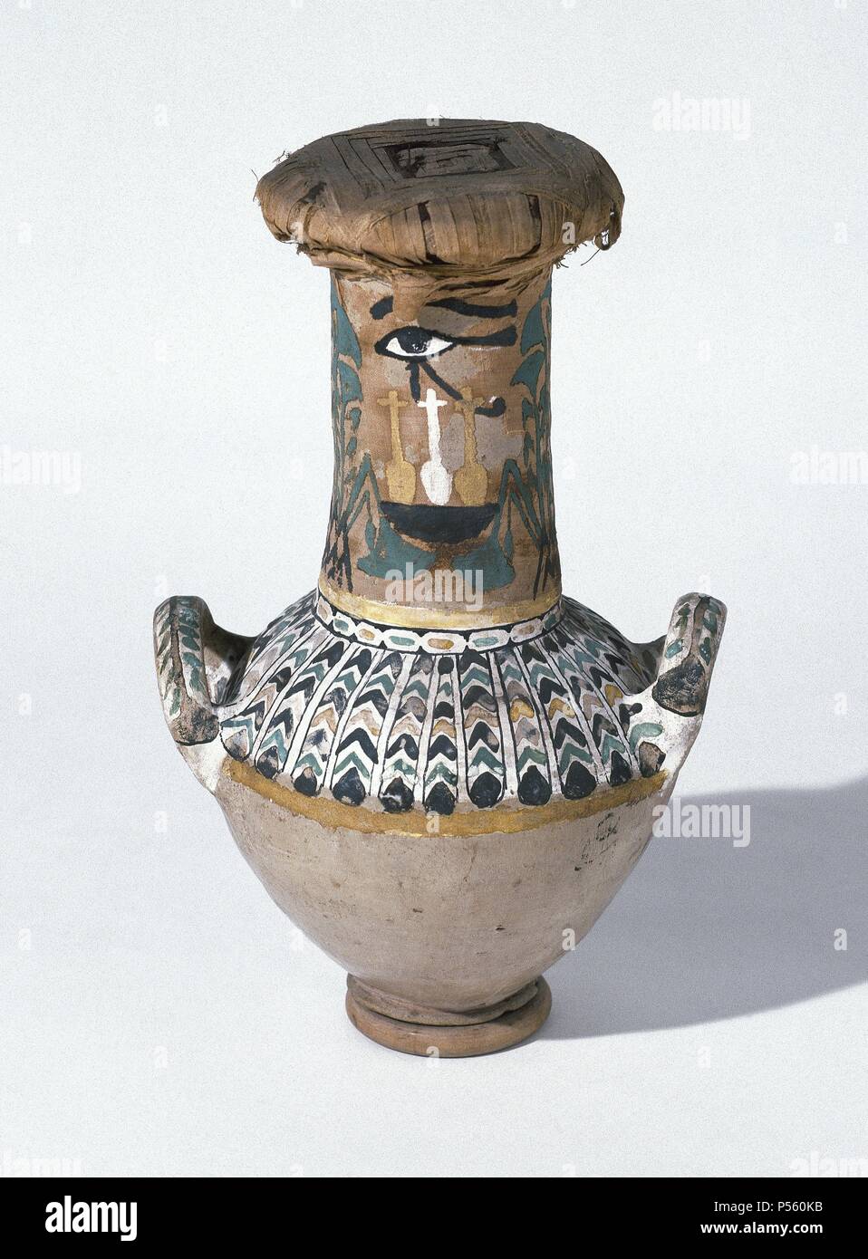Egypt. Polychromed vase sealed with fabric. From the tomb of royal