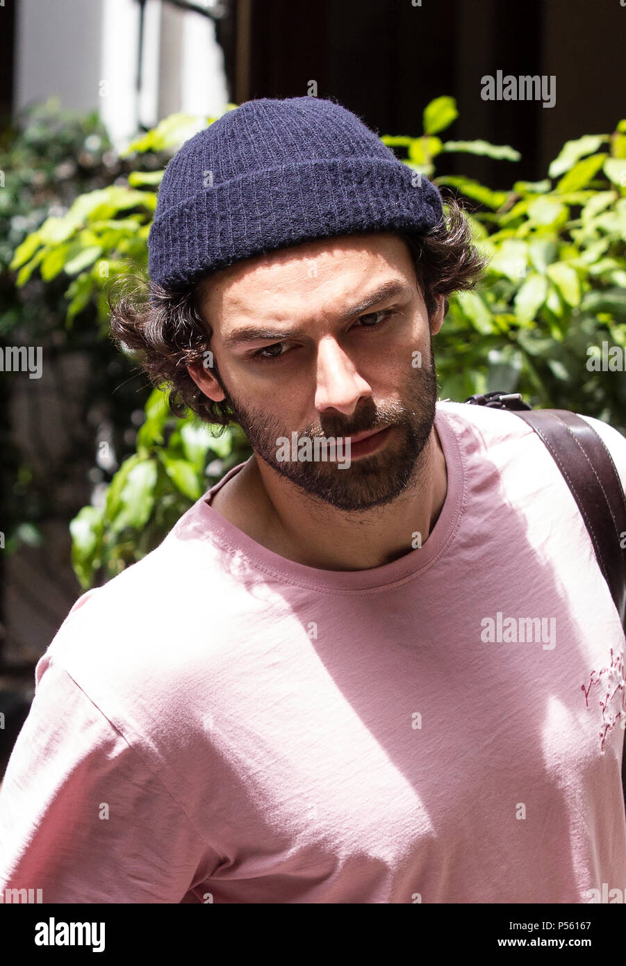 Aiden Turner actor best-known for his role in the BBC series ’Poldark’ arriving at Noel Coward theatre where he's starring in 'The Lieutenant of Inis' Stock Photo