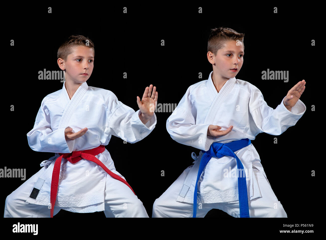 two boys training karate kata exercises at test qualification Stock ...
