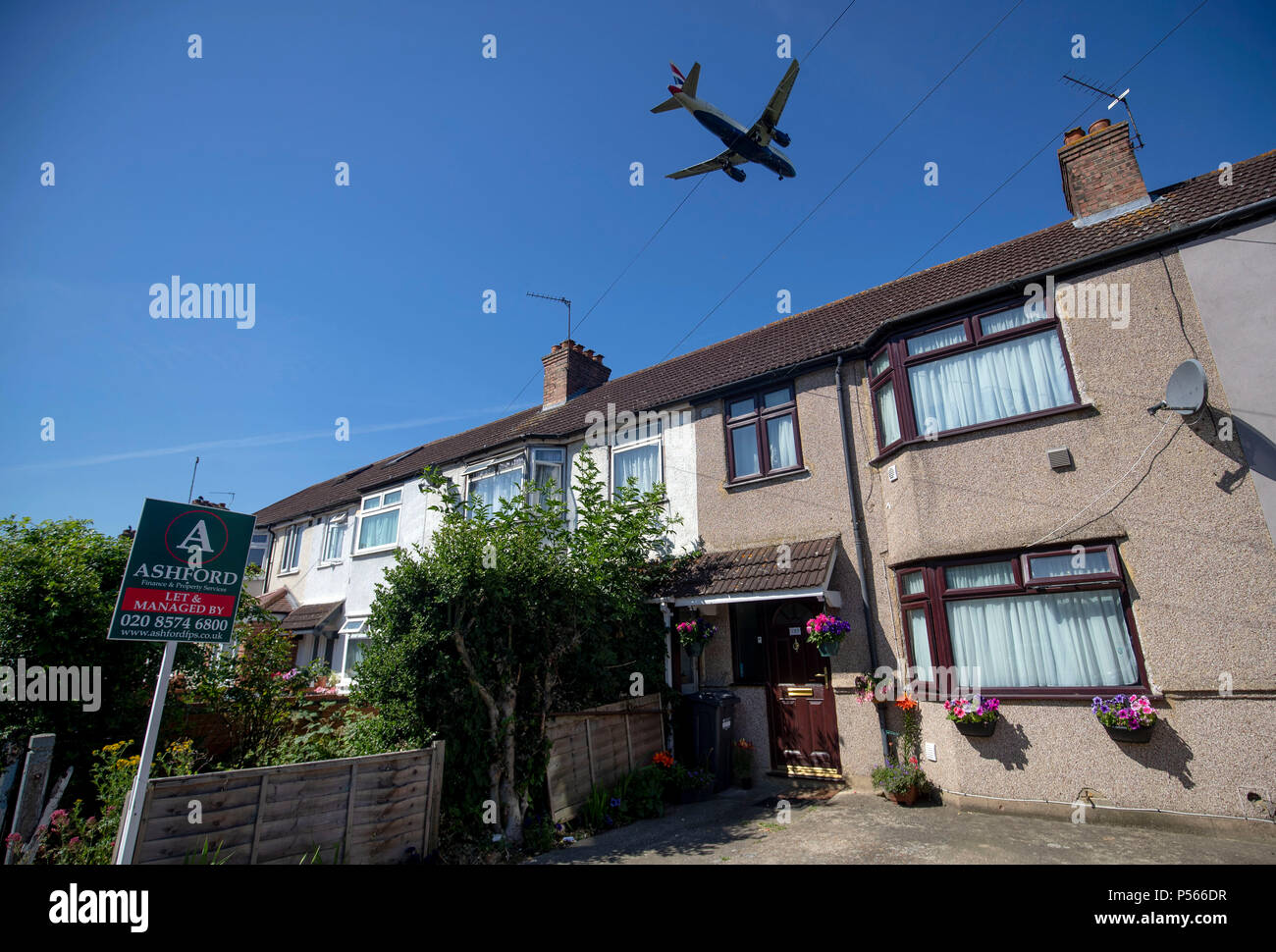 Planes land at Heathrow airport ahead of a vote in parliament which will decide whether or not Heathrow airport should have a third runway. Stock Photo