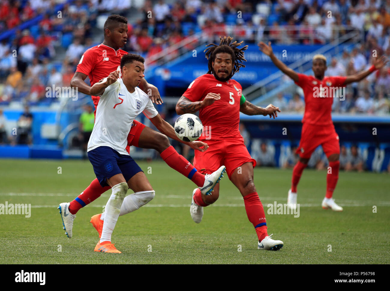 Panama's Fidel Escobar challenges England's Jesse Lingard for the ball and concedes a penalty during the FIFA World Cup Group G match at the Nizhny Novgorod Stadium Stock Photo