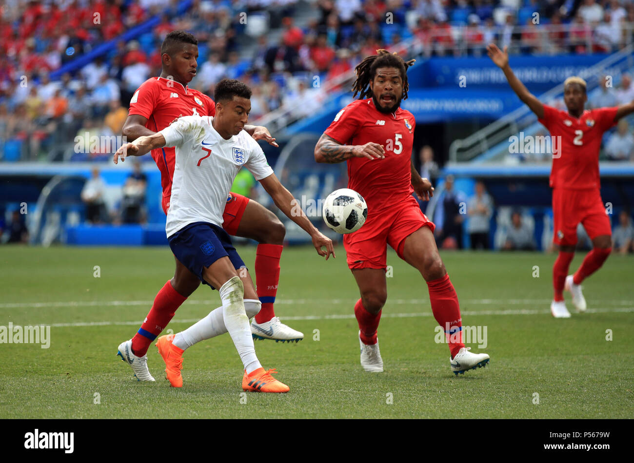 Panama's Fidel Escobar challenges England's Jesse Lingard for the ball and concedes a penalty during the FIFA World Cup Group G match at the Nizhny Novgorod Stadium Stock Photo