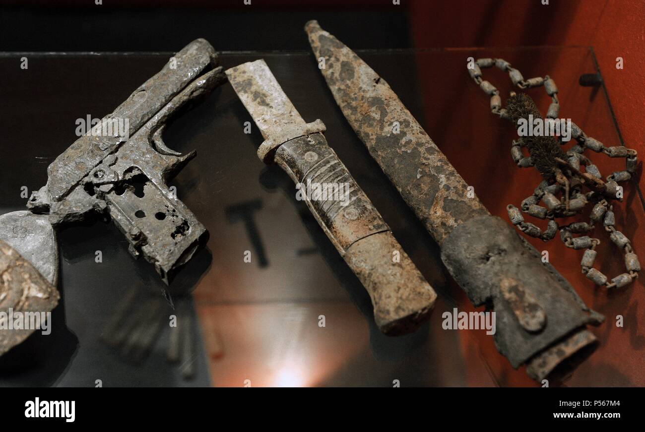 History. World War II. Latvia.  Objects found in the field of Battle near and More. Over 200 Latvians died between September 26 to 29, 1944. The Division Latvian Legion 19 or 19th Waffen SS Grenadier Division stopped the Red Army's advance towards Riga. The objects were excavated between 1994 and 1997. Occupation Museum. Riga. Latvia. Stock Photo