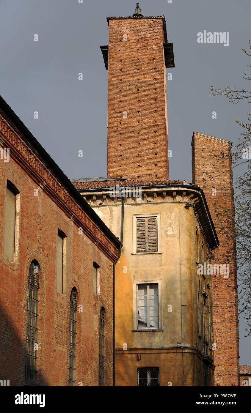 Italy. Pavia. The two medieval towers. Erected between 12th and 13th centuries. Leonardo Da Vinci Square. Stock Photo