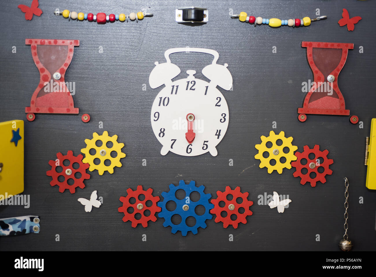 Wooden big yellow clock in playground. Time abstraction Stock Photo Alamy