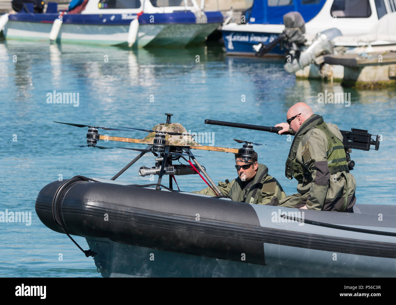 Military boat fitted with a military combat drone, designed by Mike Ring of Ring Powercraft, on River Arun, Littlehampton, West Sussex, England, UK. Stock Photo