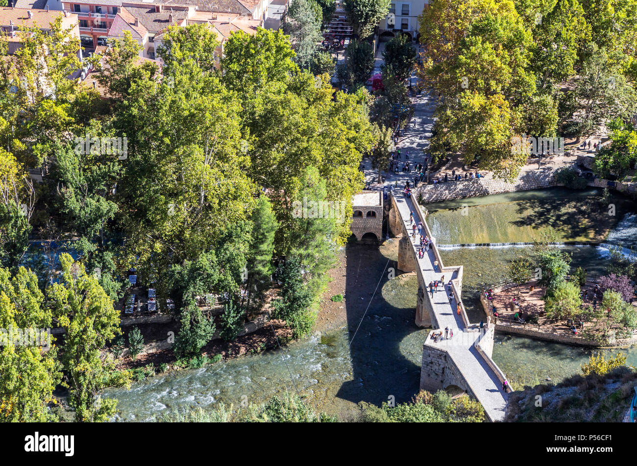 Alcala del Jucar, Spain - October 29, 2016: Roman bridge, located in the central part of the town, to its passage by the river Jucar, at the top of mo Stock Photo