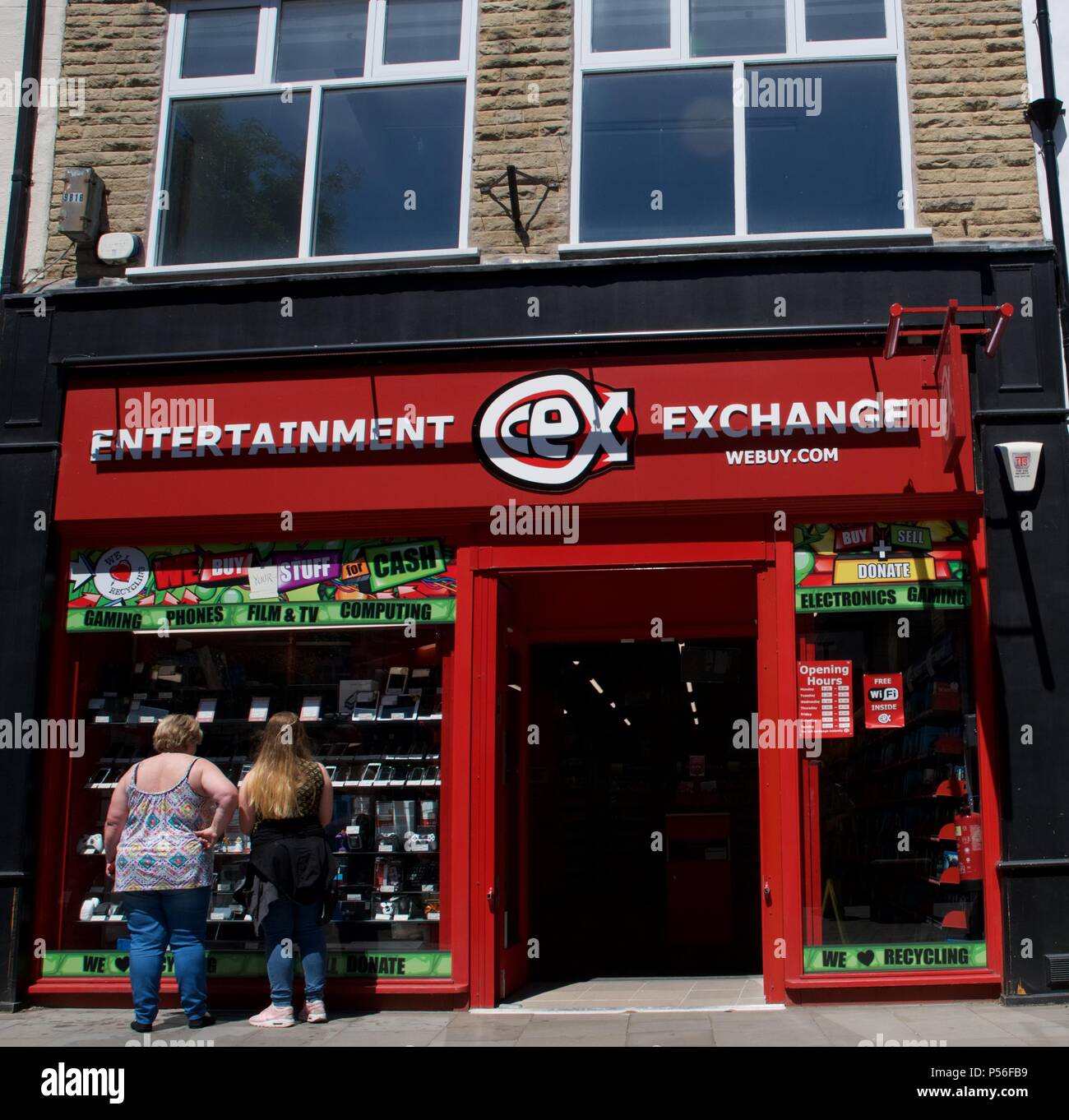 Window shopping at Entertainment Exchange in Buxton, Derbyshire Stock