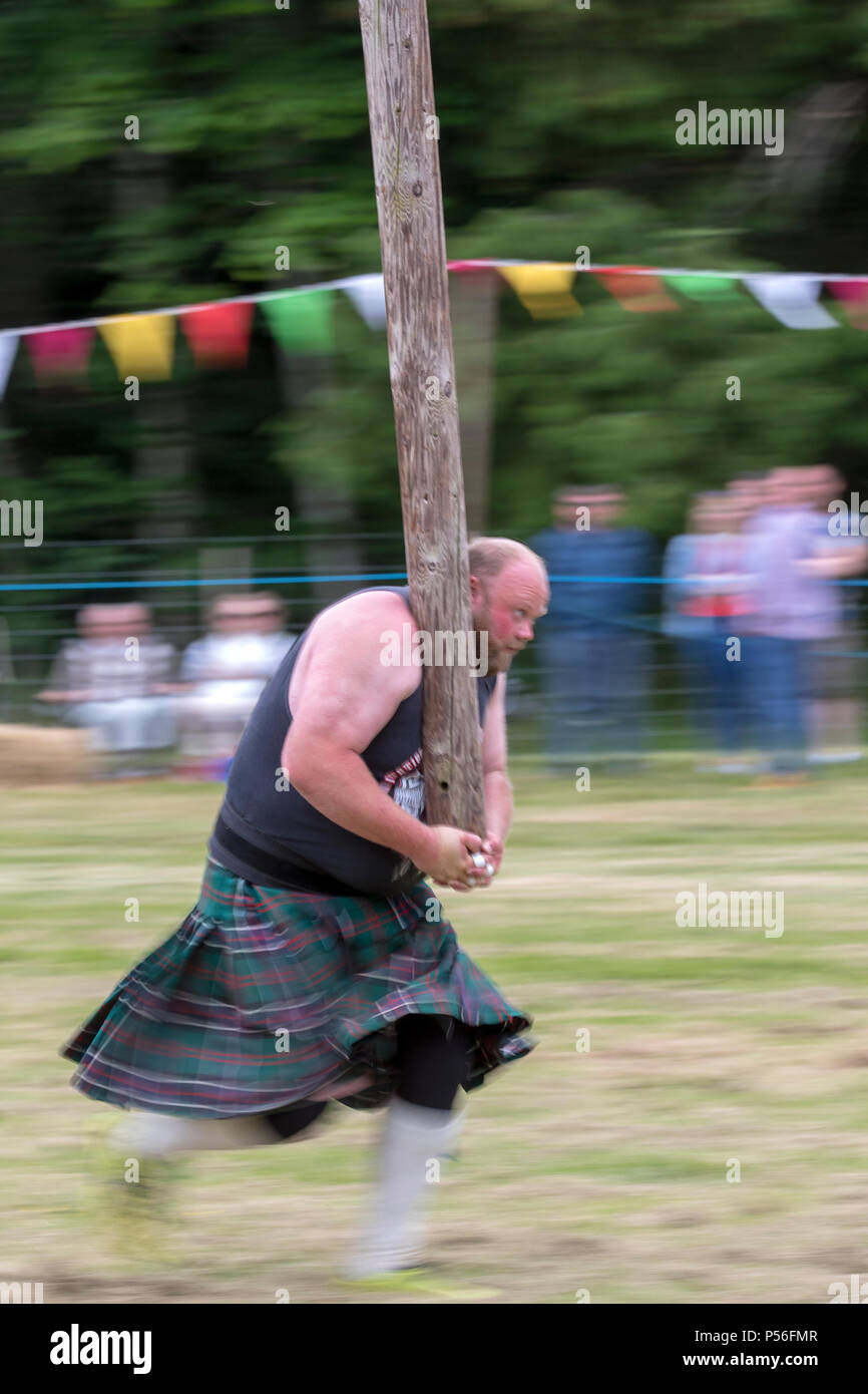 Drumtochty Games, Scotland Jun 23, 2018 A competitor in the caber toss, a traditional