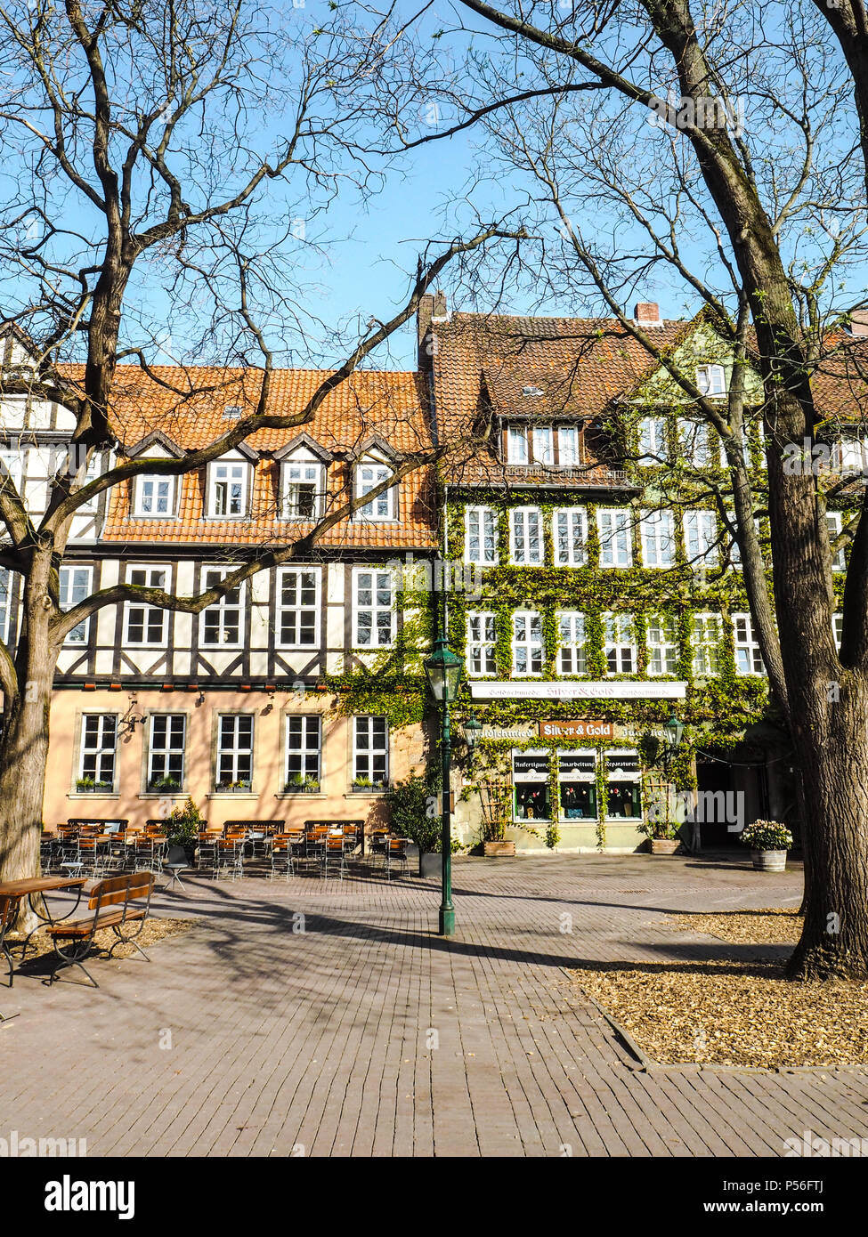 Traditional half-timbered buildings at the Ballhofplatz square in the old town and city center of Hannover Germany Stock Photo