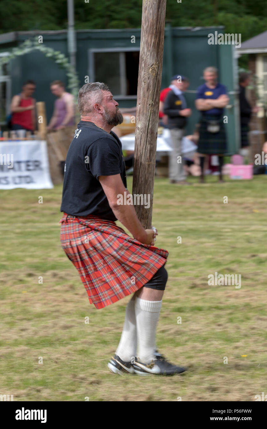 Drumtochty Games, Scotland Jun 23, 2018 A competitor in the caber toss, a traditional