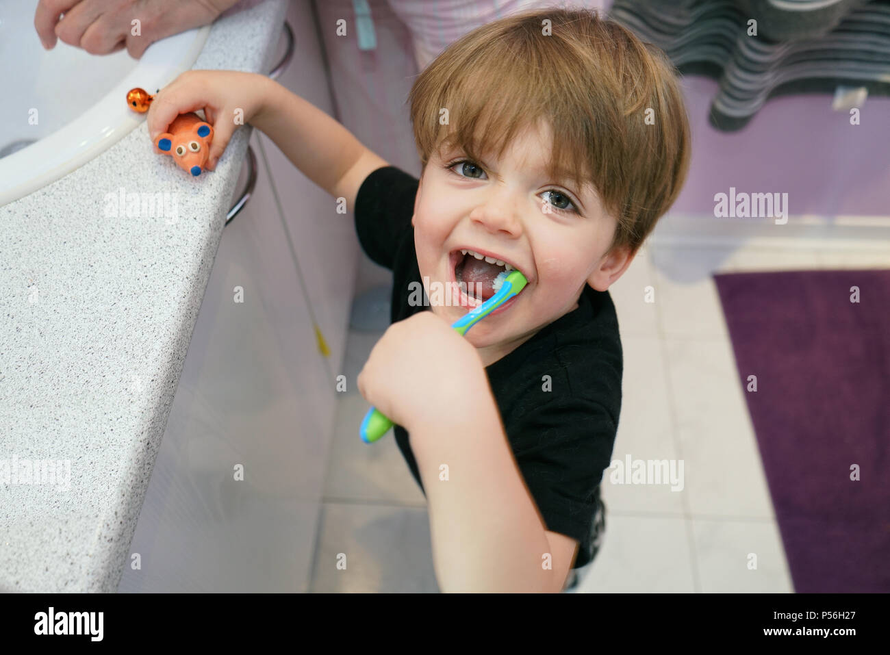 Montreal, Canada, June 24, 2018. Young 3 year-old boy brushing his teeth.Credit:Mario Beauregard/Alamy Live News Stock Photo