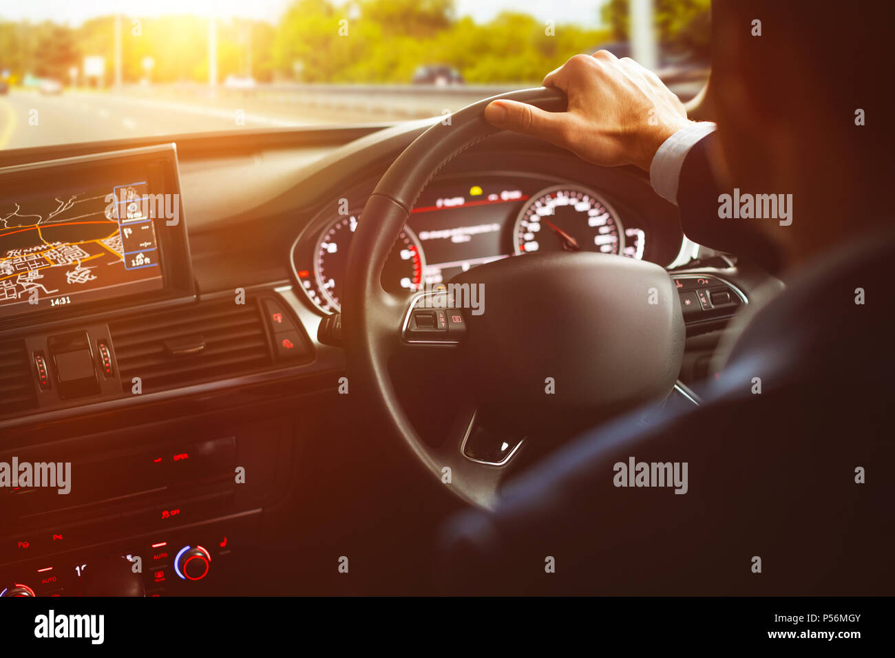 Close-up of steering wheel and navigation system Stock Photo