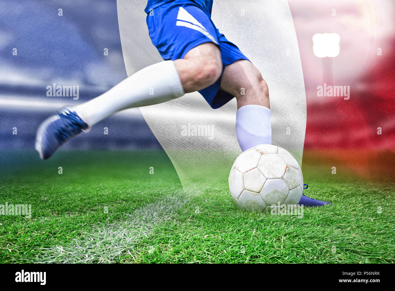 Composite image of football player kicking ball Stock Photo Alamy