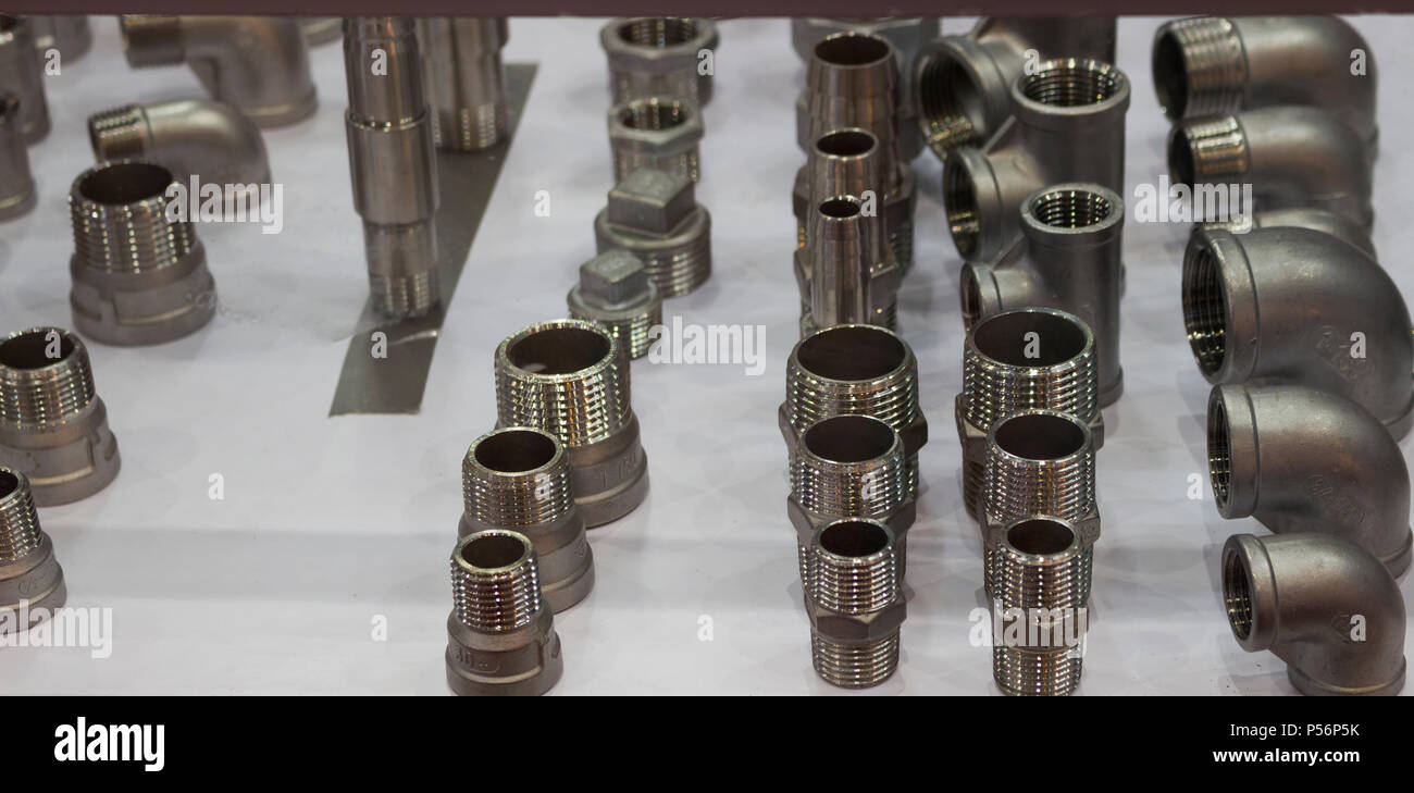 Stainless steel Fittings for pipes ; selective focus Stock Photo Alamy
