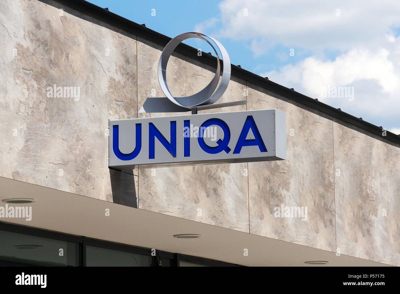 SAALBACH-HINTERGLEMM, AUSTRIA - JUNE 21 2018: Uniqa Insurance Group AG company logo on branch building on June 21, 2018 in Saalbach-Hinterglemm, Austr Stock Photo