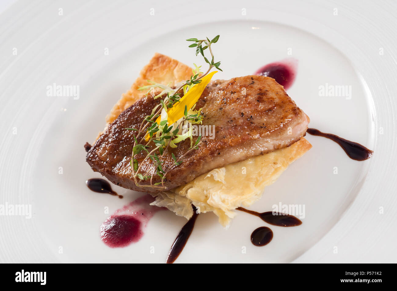 panfried goose liver with red wine apple Stock Photo Alamy
