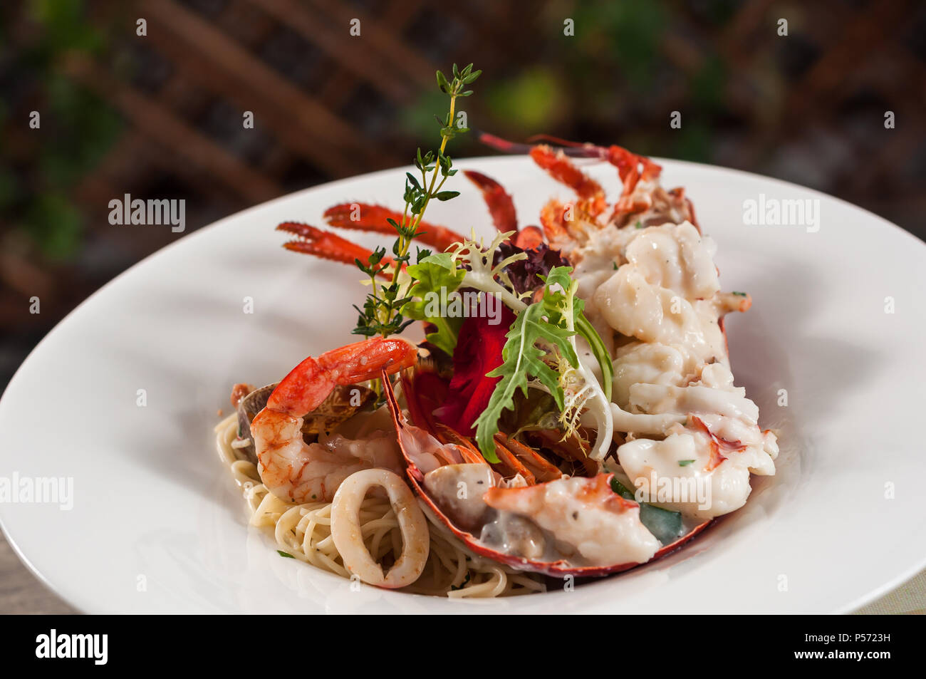 baked lobster with seafood and noodles Stock Photo Alamy