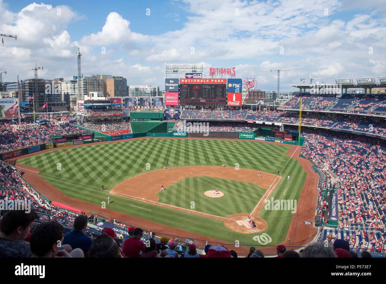 Wide view of Nationals Park on a sunny, cloudy summer day in Washington DC. Washington Nationals lost to the Philadlephia Phillies 5 - 3. Stock Photo