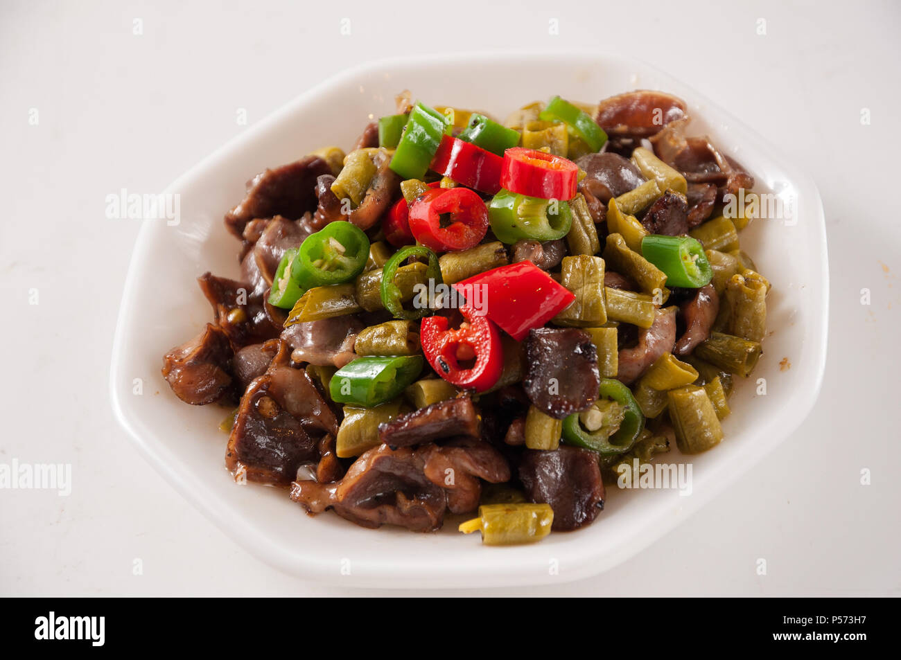 Sour bean fried chicken giblets Stock Photo Alamy
