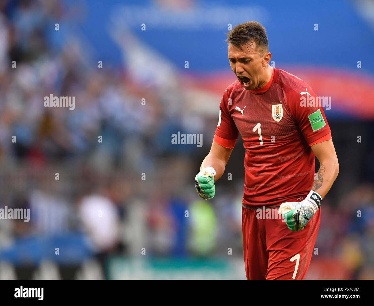 Samara, Russia. 25th June, 2018. Soccer: World Cup, group stages, group A, 3rd matchday Uruguay vs Russia, at Samara Stadium. Uruguay's goalkeeper Fernando Muslera celebrates the 3-0 goal. Credit: Marius Becker/dpa/Alamy Live News Stock Photo