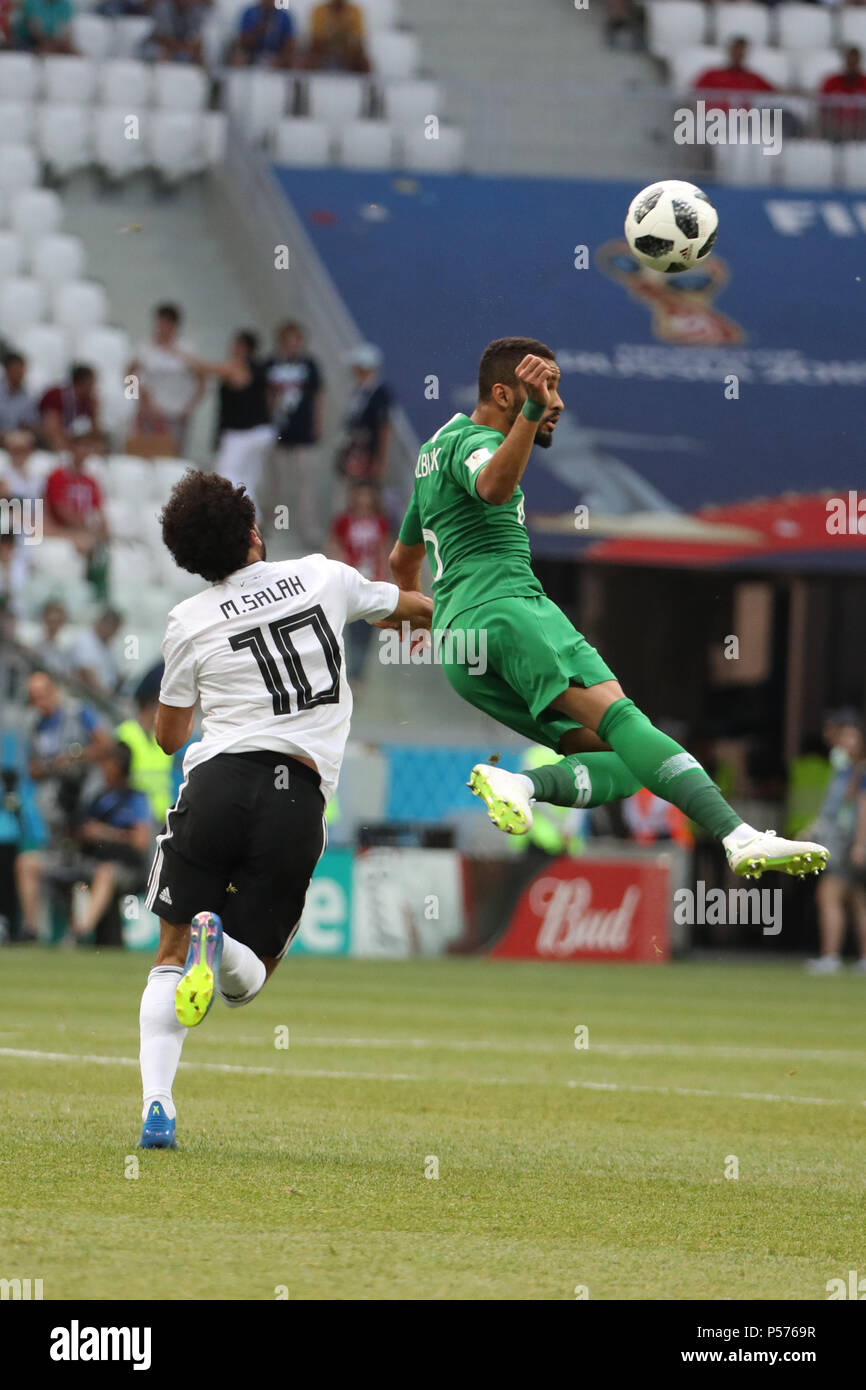 Volgograd, Russia. 25th June, 2018. Egypt's Mohamed Salah (L) battles for the ball with Saudi Arabia's Mohammed Al-Breik during the FIFA World Cup 2018 Group A soccer match between Saudi Arabia and Egypt at the Volgograd Arena in Volgograd, Russia, 25 June 2018. Credit: Ahmed Ramadan/dpa/Alamy Live News Stock Photo