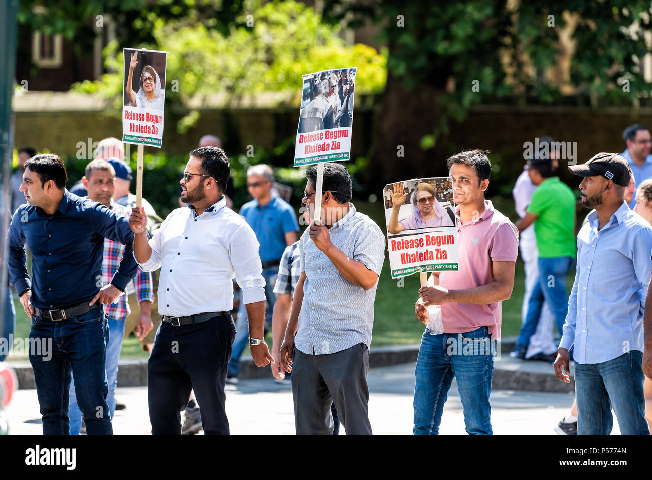 London, United Kingdom - June 25, 2018: People, men at Bangladesh protest in UK, England by Westminster, signs for Begum Khaleda Zia, former Nationalist Party leader Credit: Kristina Blokhin/Alamy Live News Stock Photo