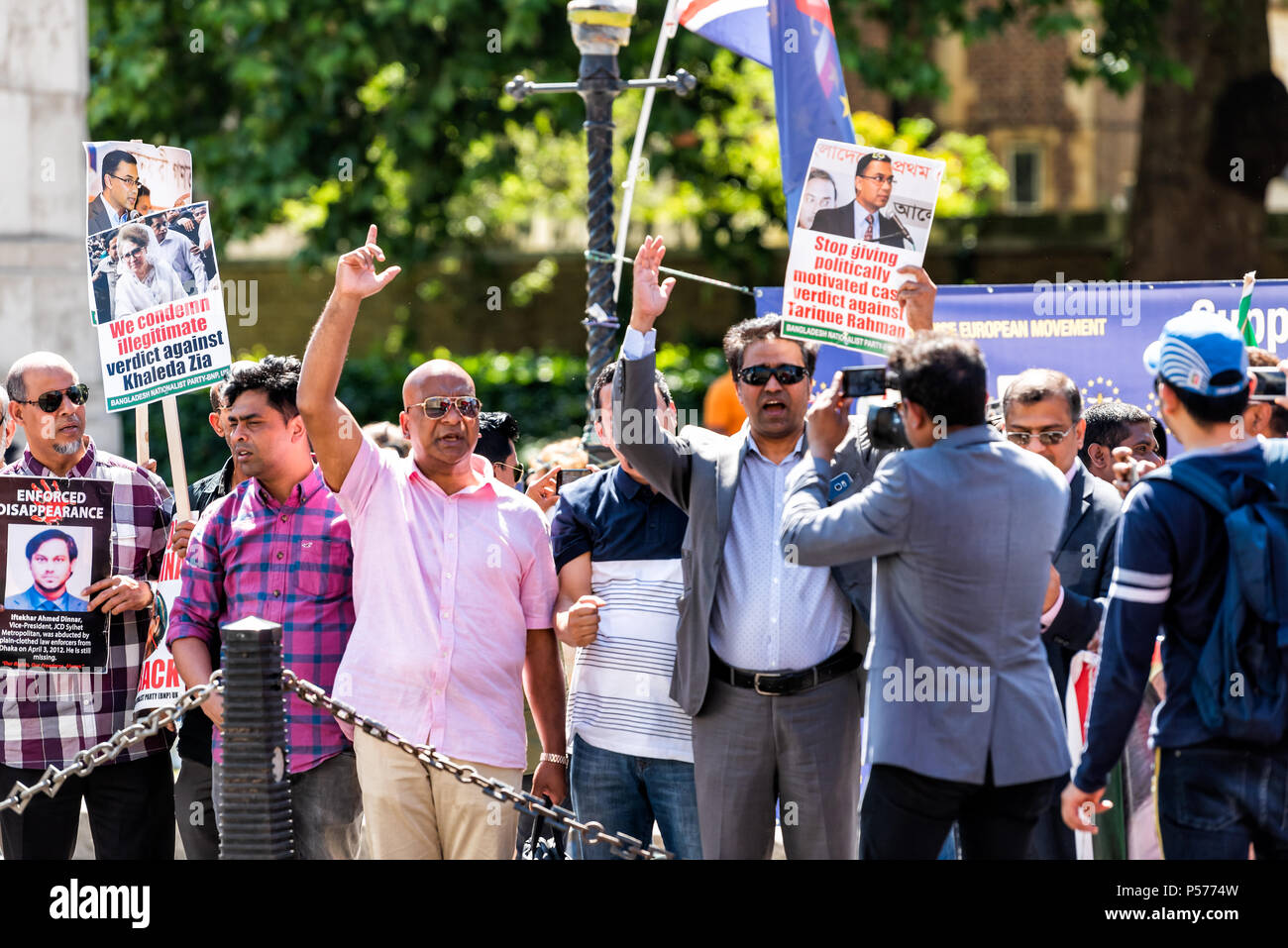 London, United Kingdom - June 25, 2018: People, men at Bangladesh protest in UK, England by Westminster with signs for releasing Begum Khaleda Zia, Terique Rahman Credit: Kristina Blokhin/Alamy Live News Stock Photo