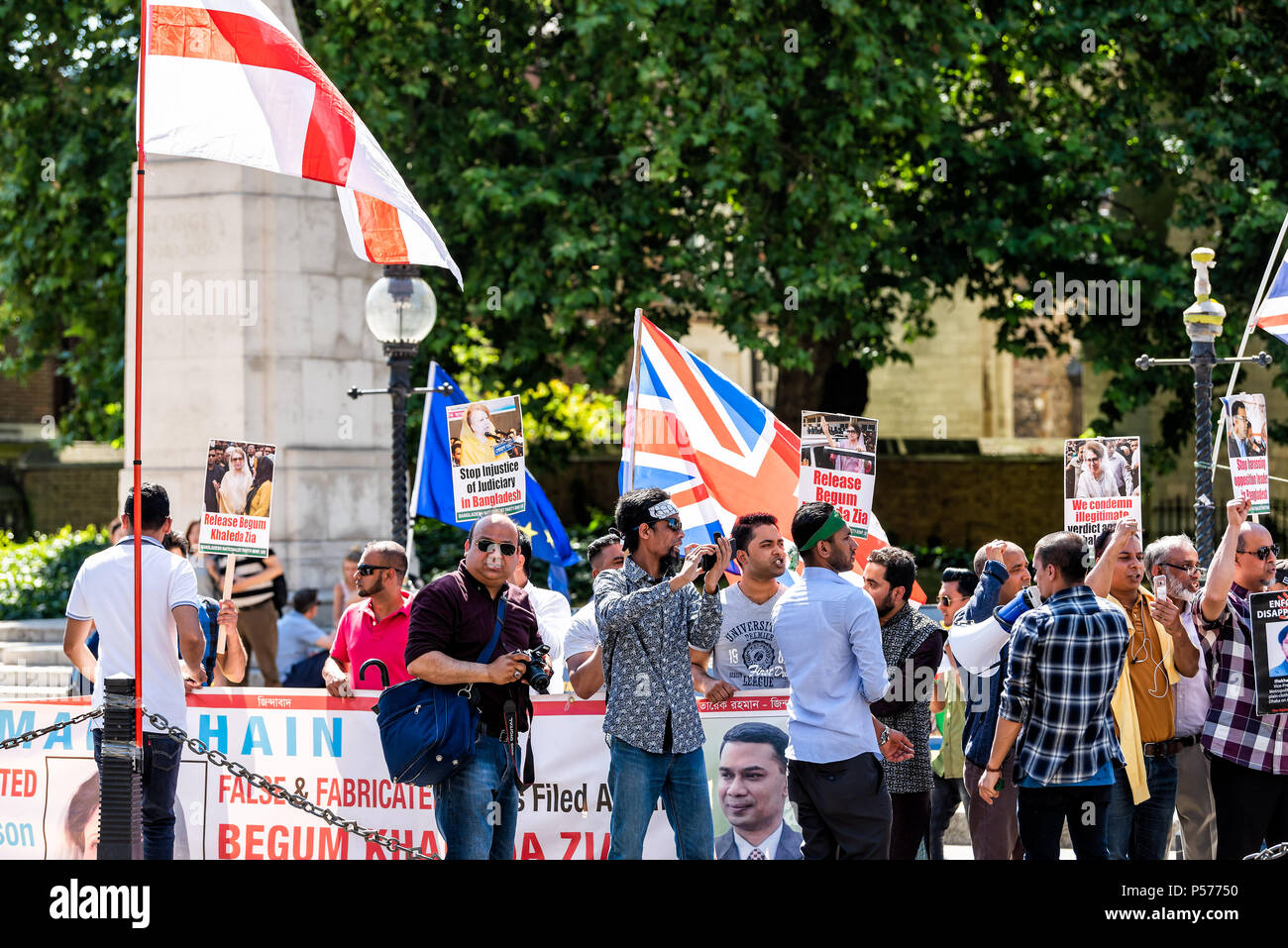 London, United Kingdom - June 25, 2018: People standing at Bangladesh protest in UK England by Westminster with signs for releasing Begum Khaleda Zia, former Nationalist Party leader, flags Credit: Kristina Blokhin/Alamy Live News Stock Photo