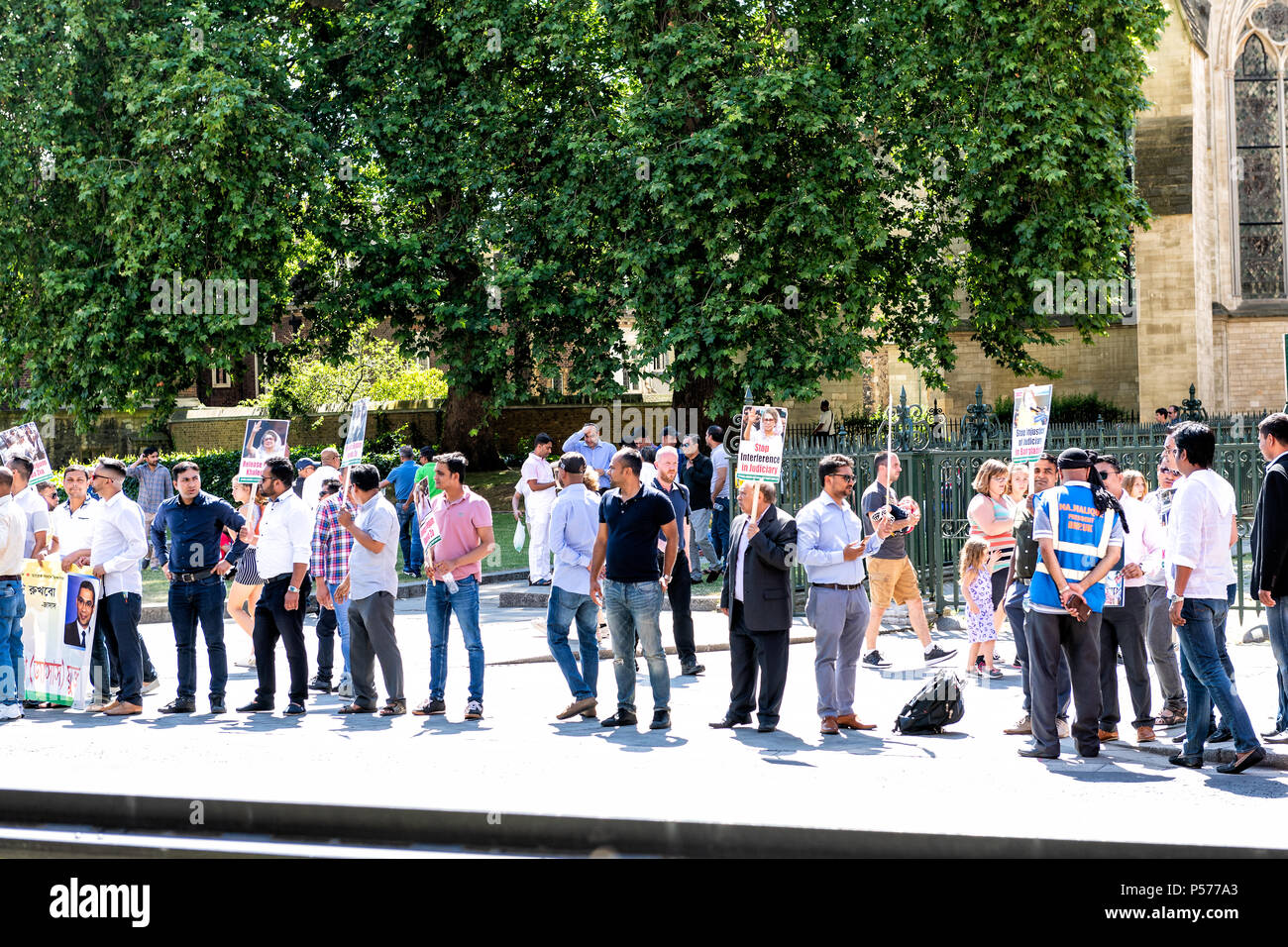 London, United Kingdom - June 25, 2018: People, crowd at Bangladesh protest in UK, England by Westminster, signs for Begum Khaleda Zia, former Nationalist Party leader Credit: Andriy Blokhin/Alamy Live News Stock Photo