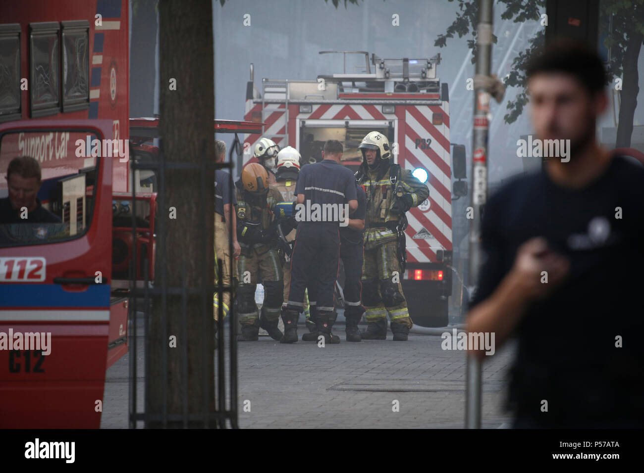 Brussels, Belgium. June 25th, 2018. Firefighters try to extinguish a ...