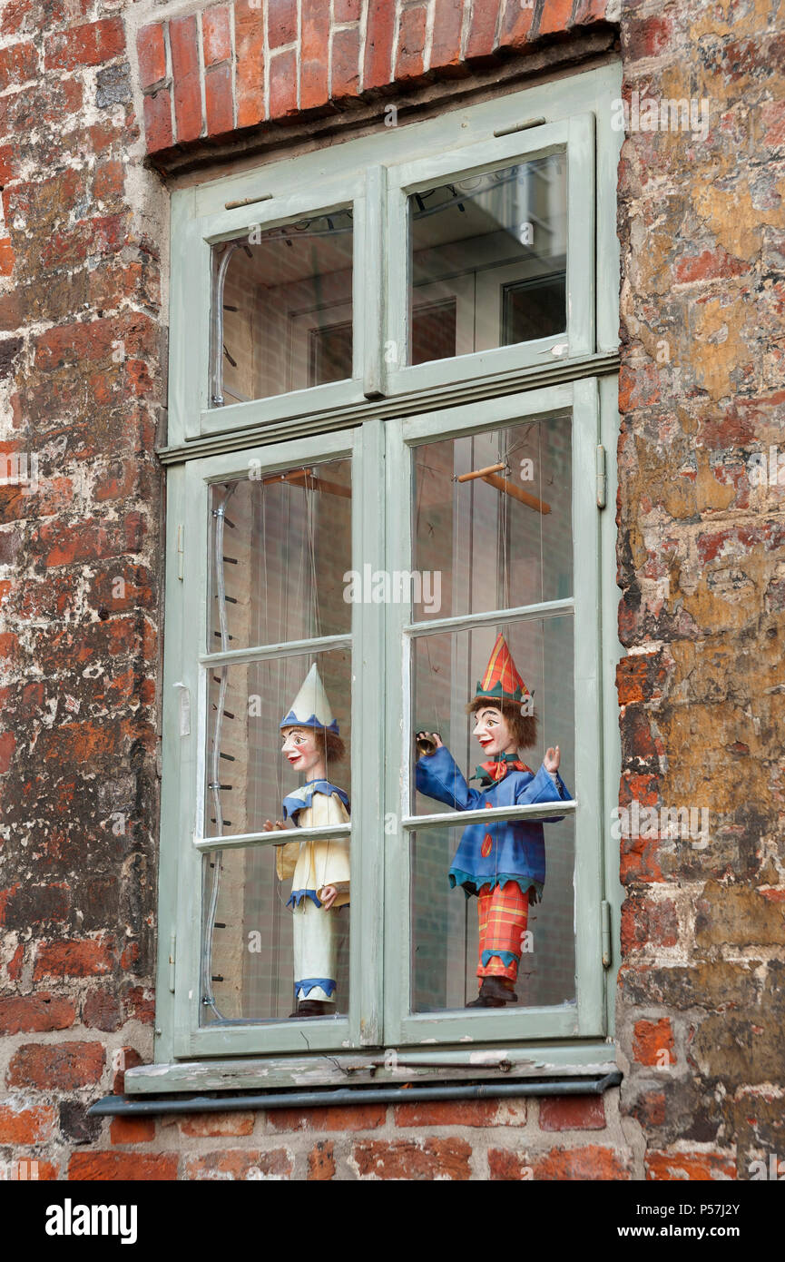 Punchers in the window of the Theatre Figure Museum, Lübeck, Schleswig-Holstein, Germany Stock Photo