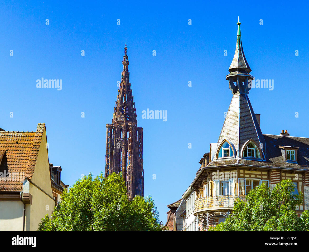 Strasbourg, Volkskunst building 1905, cathedral spire in the distance , Alsace, France, Europe, Stock Photo