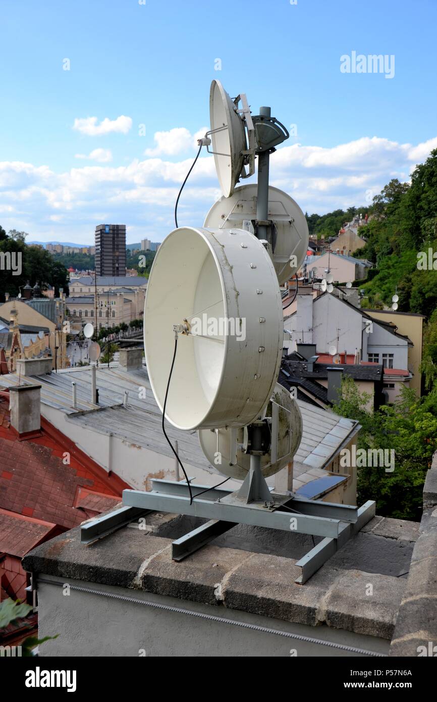 Antennas on the roof of a house in Karlovy Vary in Czech Republic Stock Photo