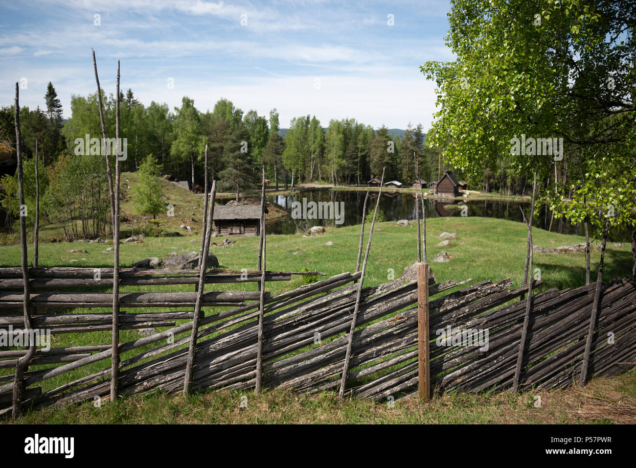 Simple fence construction made from available materials, Norway. Stock Photo