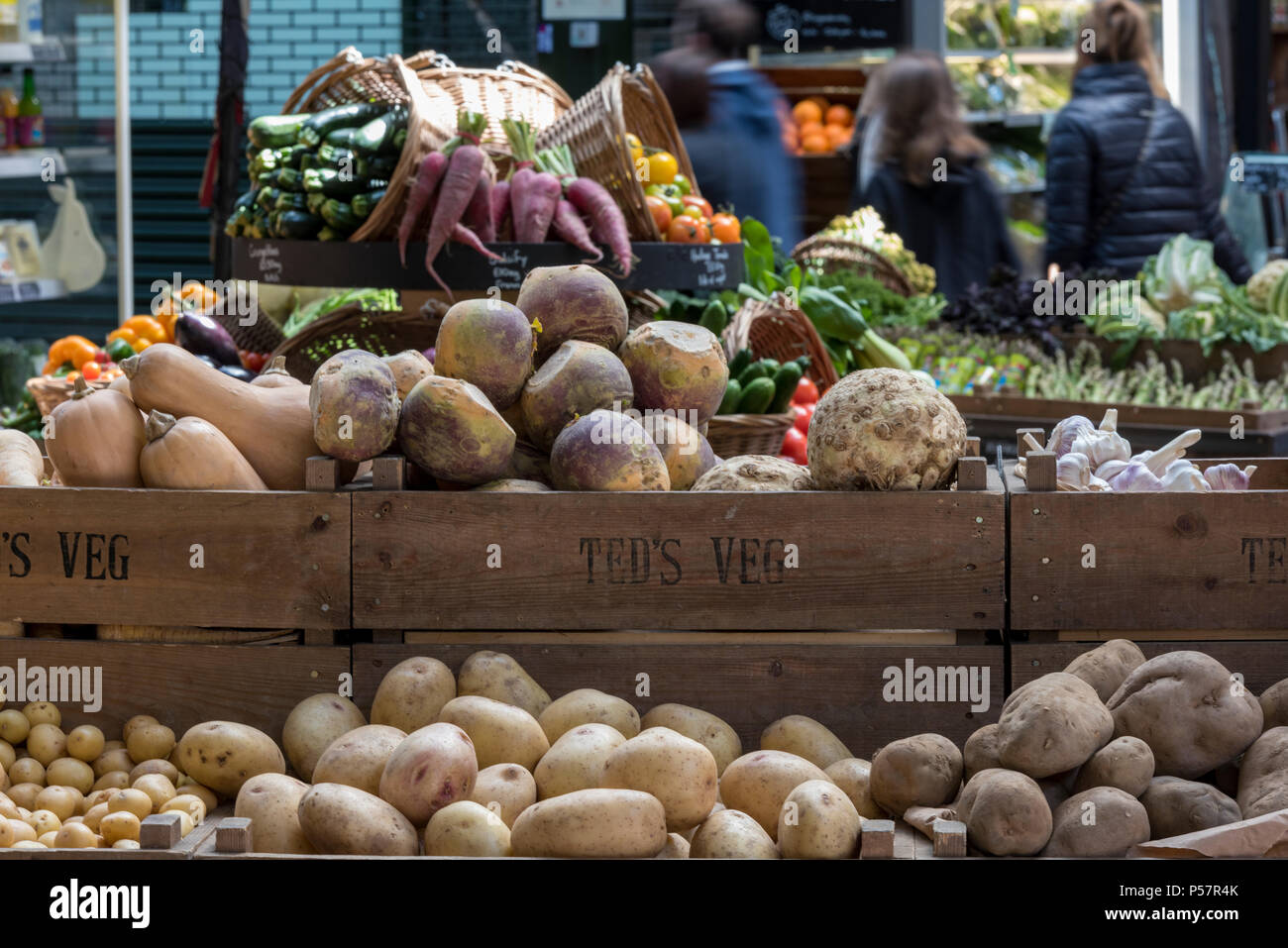 potatoes in wooden crates at a market stall Stock Photo
