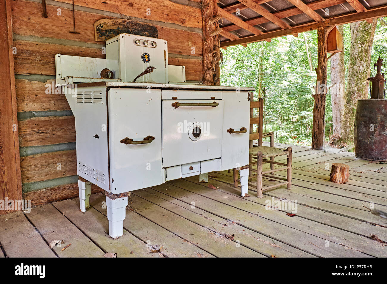 Vintage antique wrought iron wood or coal burning stove made by Home Comfort, circa 1864 located in rural Alabama. Stock Photo