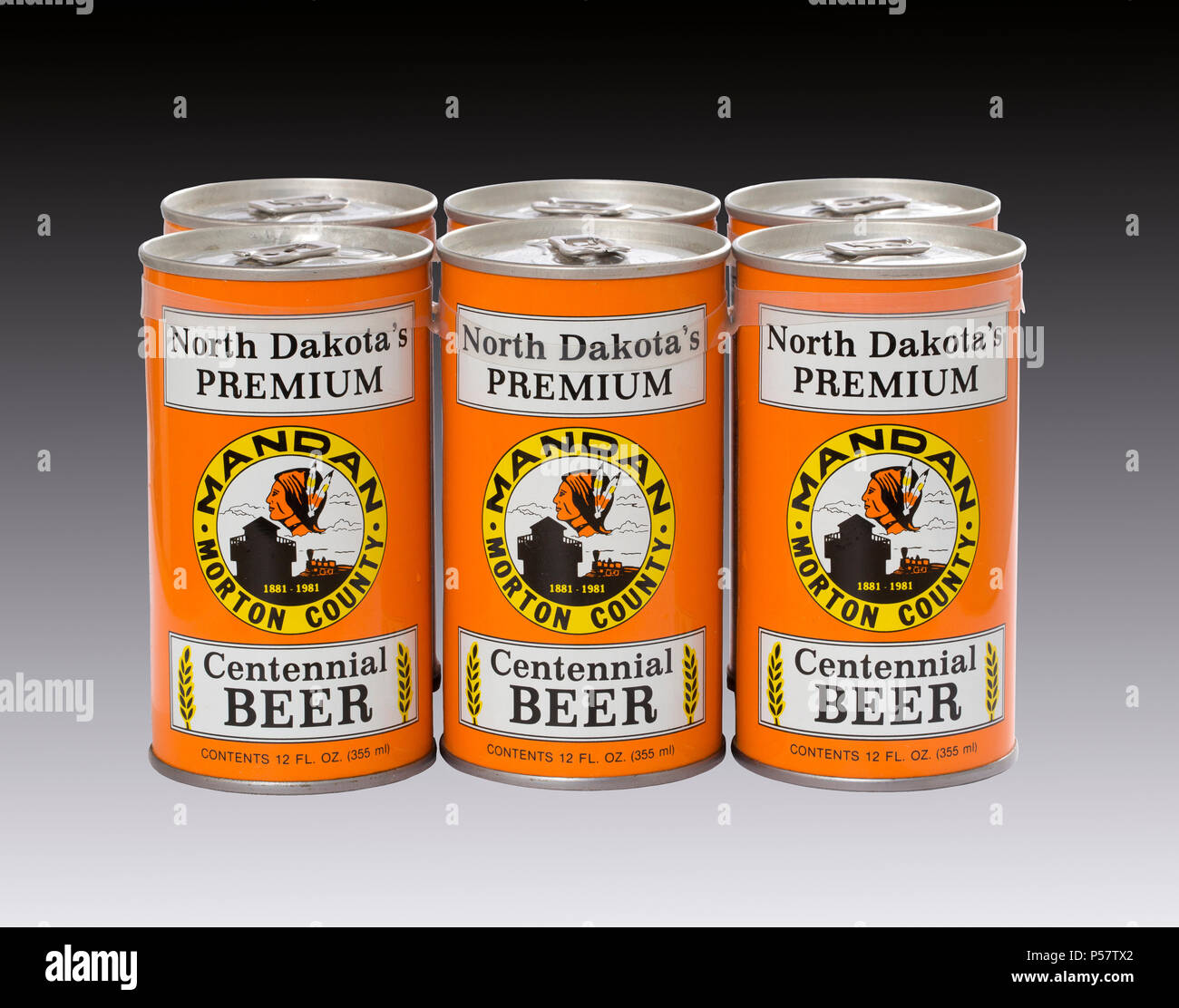 A 6 pack of beer cans commemorating Mandan and Morton County North Dakota's 1981 centennial celebration.  The beer was brewed by the August Schell Bre Stock Photo