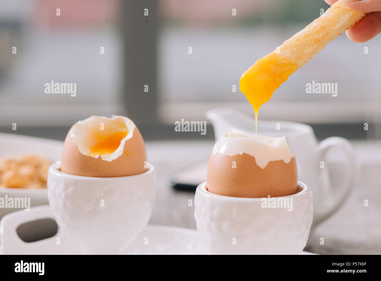 Soft boiled eggs with toast. Healthy fitness breakfast. Stock Photo