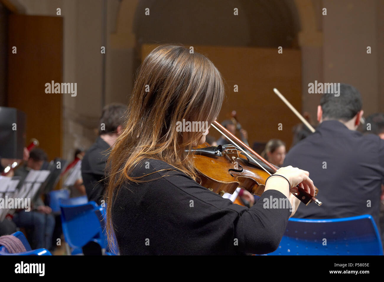 Young woman playing a violin hi-res stock photography and images - Alamy