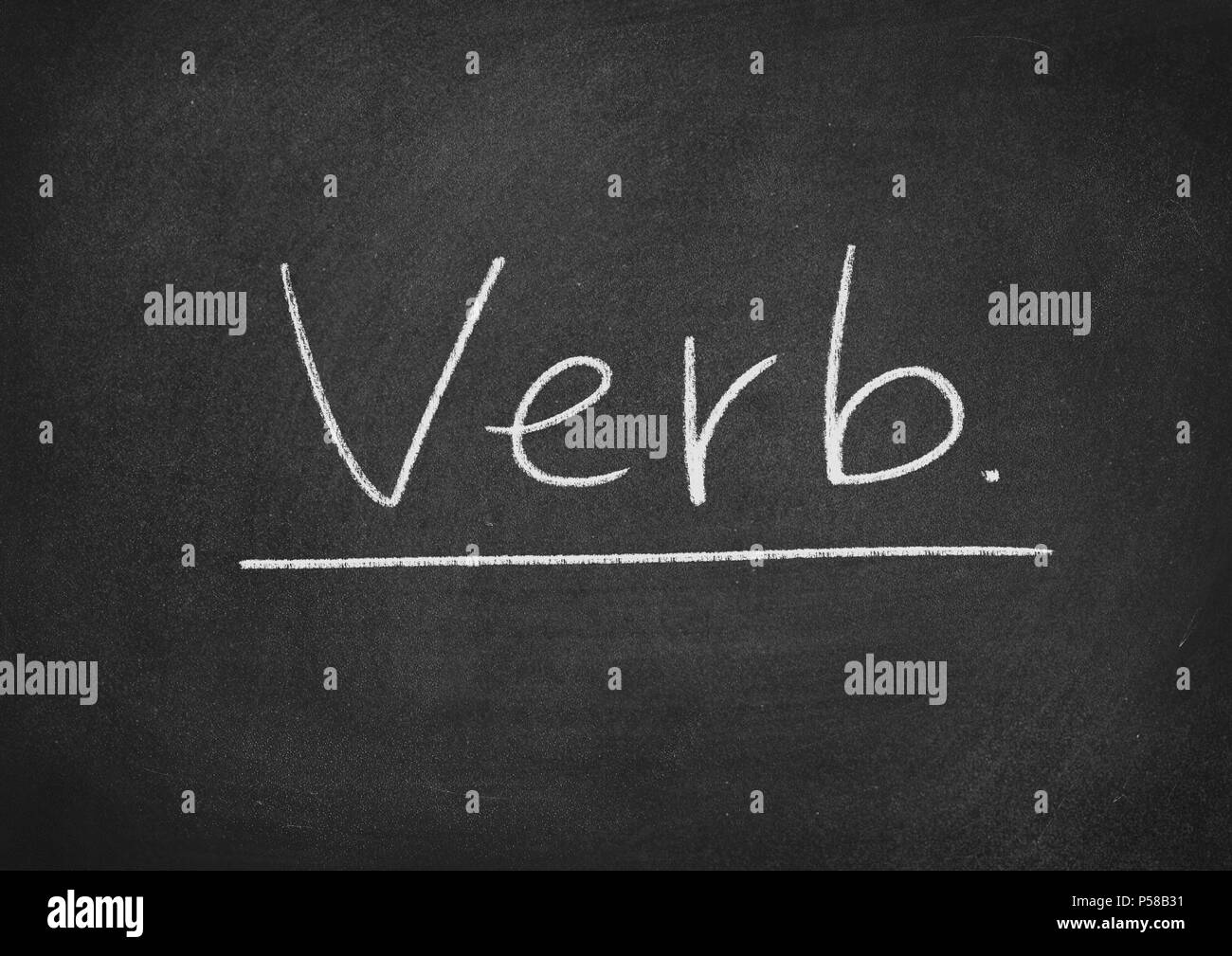 verb concept word on a blackboard background Stock Photo Alamy